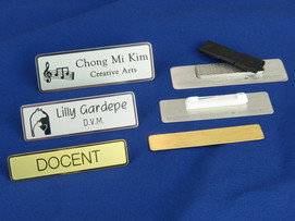 ENTER PAGE KEYWORDS burnished black lettering on brass and nickel name tags ENTER PAGE KEYWORDS burnished black lettering on brass and nickel name tags