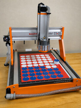 Engraving machine with custom bed
