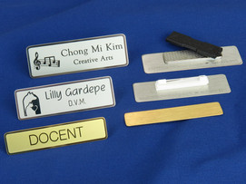 Silver and gold custom metal name tags Silver and gold custom metal name tags